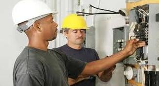 Electricians fixing wiring